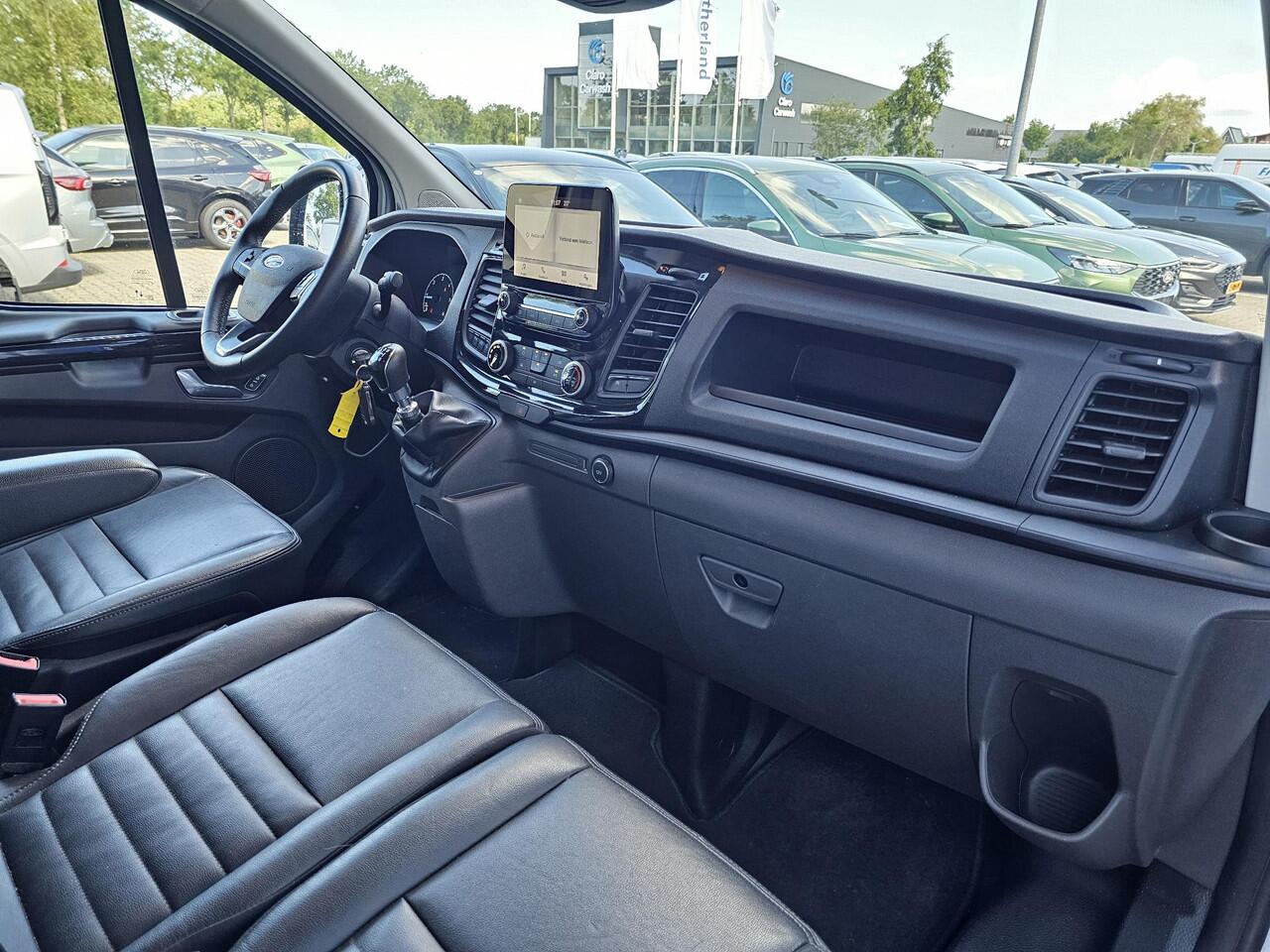Ford TRANSIT CUSTOM 300 2.0 TDCI L2H1 Trail | Glasslook panelen | Raptor grille | Camera | Trekhaak | Leder | Voorruitverwarming | Airco | Cruise control etc.