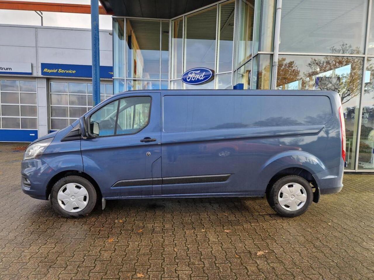 Ford TRANSIT CUSTOM 300 2.0 TDCI L2H1 Trend 130pk SCI | Automaat | Driver Assistance Pack Premium | Navigatiesysteem | Camera| Reservewiel | Chrome Blue Metallic