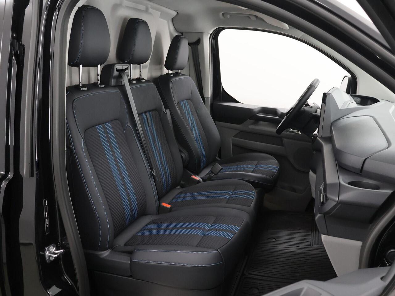 Ford TRANSIT CUSTOM 300 2.0 TDCI 170 PK L2 H1 SPORT | Aut. | AUTOMAAT | 2X ZIJSCHUIFDEUR | BLIND SPOT | STOELVERWARMING | STUURWIELVERWARMING | KEYLESS GO | ADAPTIEVE CRUISE CONTROL | 19" VELGEN | NAVIGATIE | CARPLAY | ANDROID AUTO | NIEUW