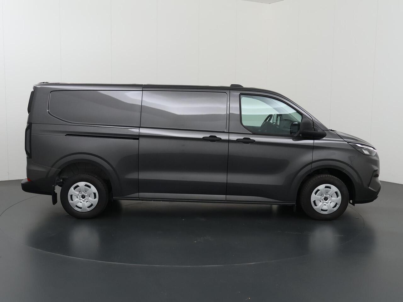 Ford TRANSIT CUSTOM 320 | 2.0 TDCI | L2 H1 | Trend | ACHTERKLEP | Climate Control | Cruise Control | Parkeercamera | Apple Carplay / Android Auto | 3-zits | Laadruimte bescherming | BPM VRIJ |