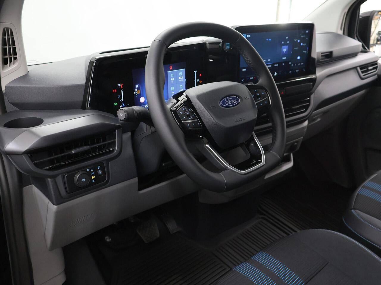 Ford TRANSIT CUSTOM 300 2.0 TDCI 170 PK L2 H1 SPORT | Aut. | AUTOMAAT | 2X ZIJSCHUIFDEUR | BLIND SPOT | STOELVERWARMING | STUURWIELVERWARMING | KEYLESS GO | ADAPTIEVE CRUISE CONTROL | 19" VELGEN | NAVIGATIE | CARPLAY | ANDROID AUTO | NIEUW