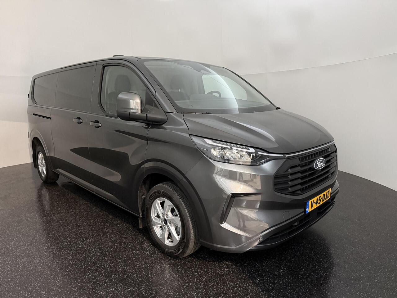 Ford TRANSIT CUSTOM 320 2.0 TDCI L2H1 Limited met o.a. Handmatig regeneratie roetfilter, een Navigatie systeem, parkeersensoren voor en achter, achteruitrijcamera, Verwarmbare voorstoelen een Verwarmbare voorruit.
