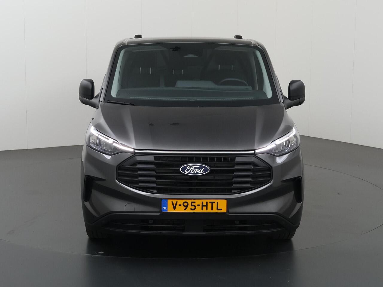 Ford TRANSIT CUSTOM 320 | 2.0 TDCI | L2 H1 | TREND | BPM VRIJ! | CAMERA | CRUISE CONTROL | CLIMATE CONTROL | CARPLAY ANDROID AUTO | 2800 KG AHW MOGELIJK | COMFORT BESTUURDERSTOEL | ACHTERKLEP | STOELVERWARMING