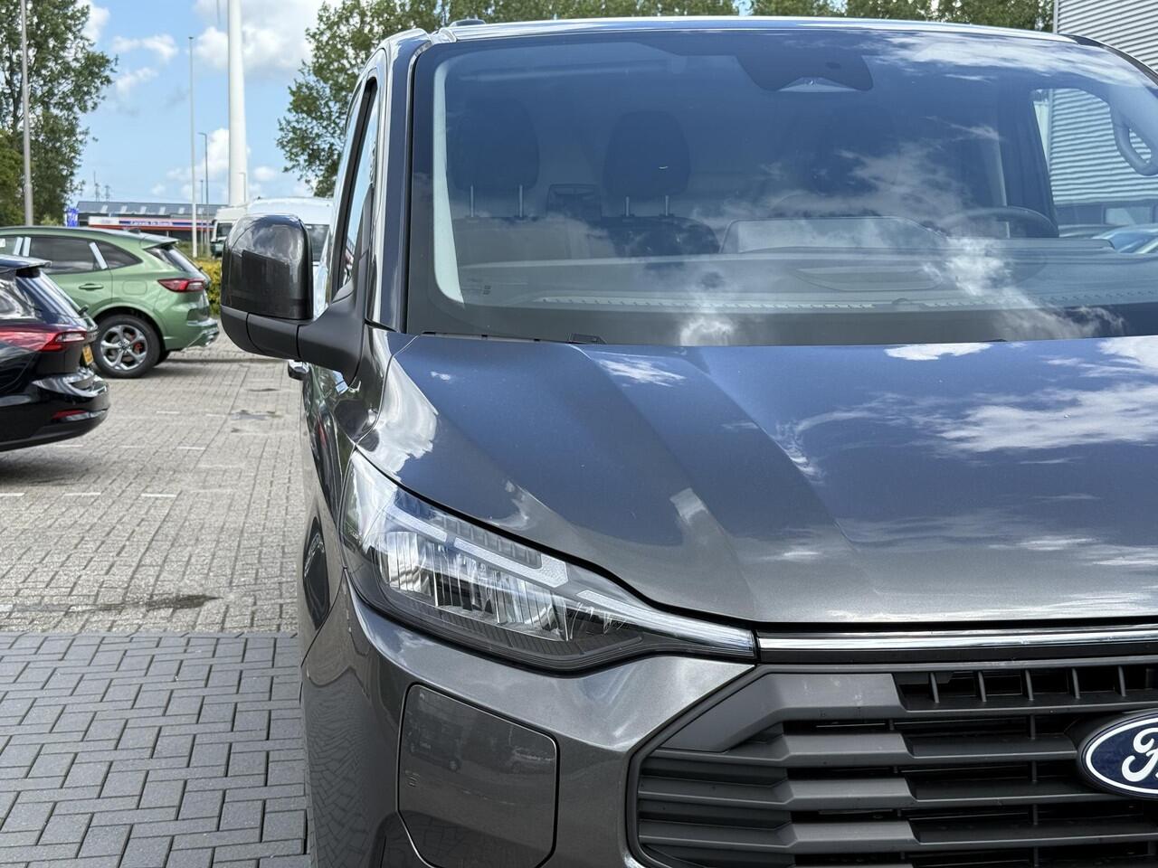 Ford TRANSIT CUSTOM 320 2.5 PHEV L2H1 Limited 233pk | 0,99% Renteactie! | Zuid | Driver Assistance pack Premium | Wegklapbare Trekhaak | Verwarmd Stuurwiel | 17 inch Licht metalen Velgen | B&O Speakers