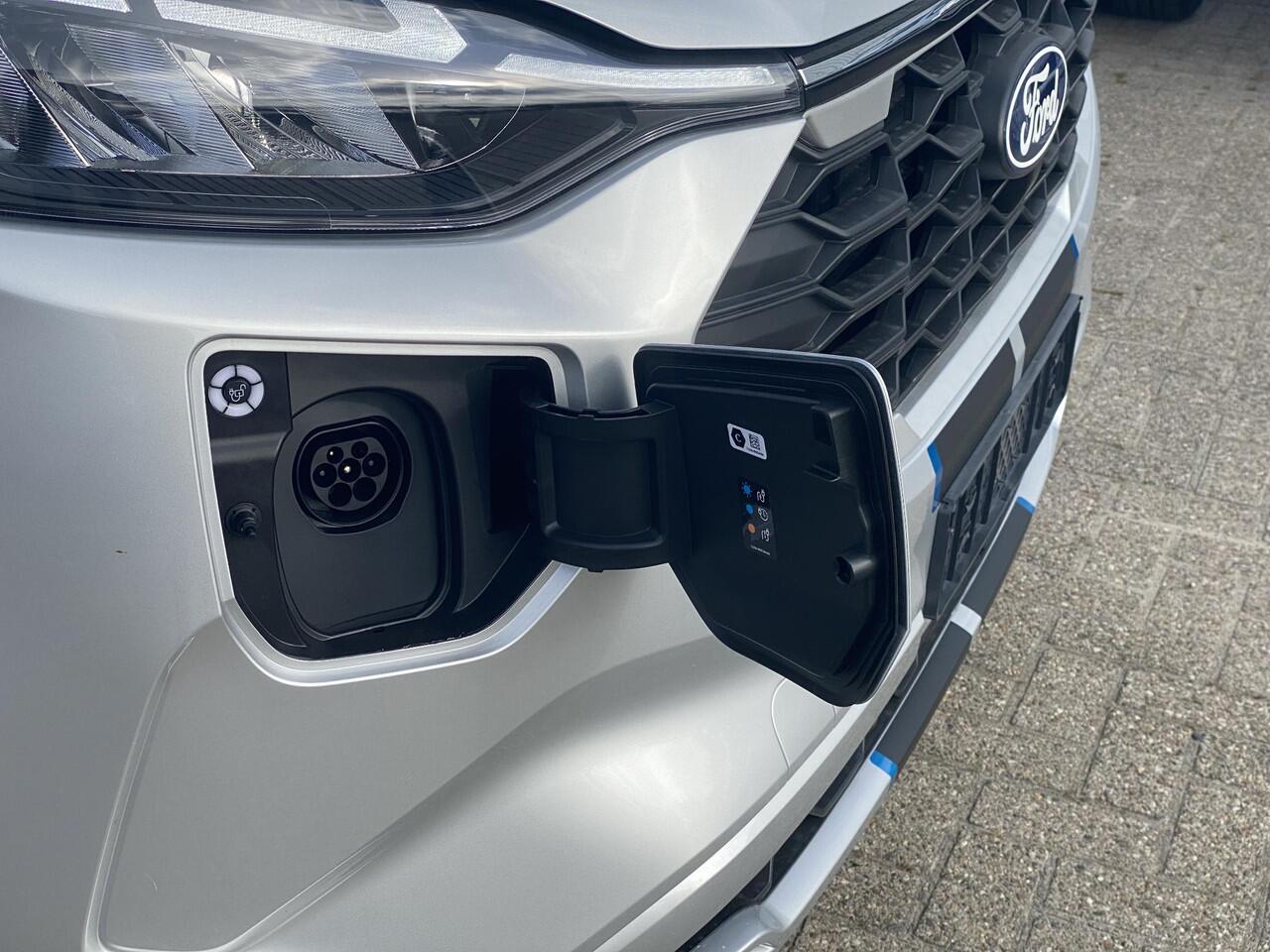 Ford TRANSIT CUSTOM 320 2.5 PHEV L2H1 Sport DC Zuid | 0,99% Renteactie | 233pk | Dubbele Cabine | Dubbele zijschuifdeur | Inklapbare trekhaak | 19 inch lichtmetalen Sport velgen (mat zwart) | Verwarmbaar stuurwiel | Navigatie systeem