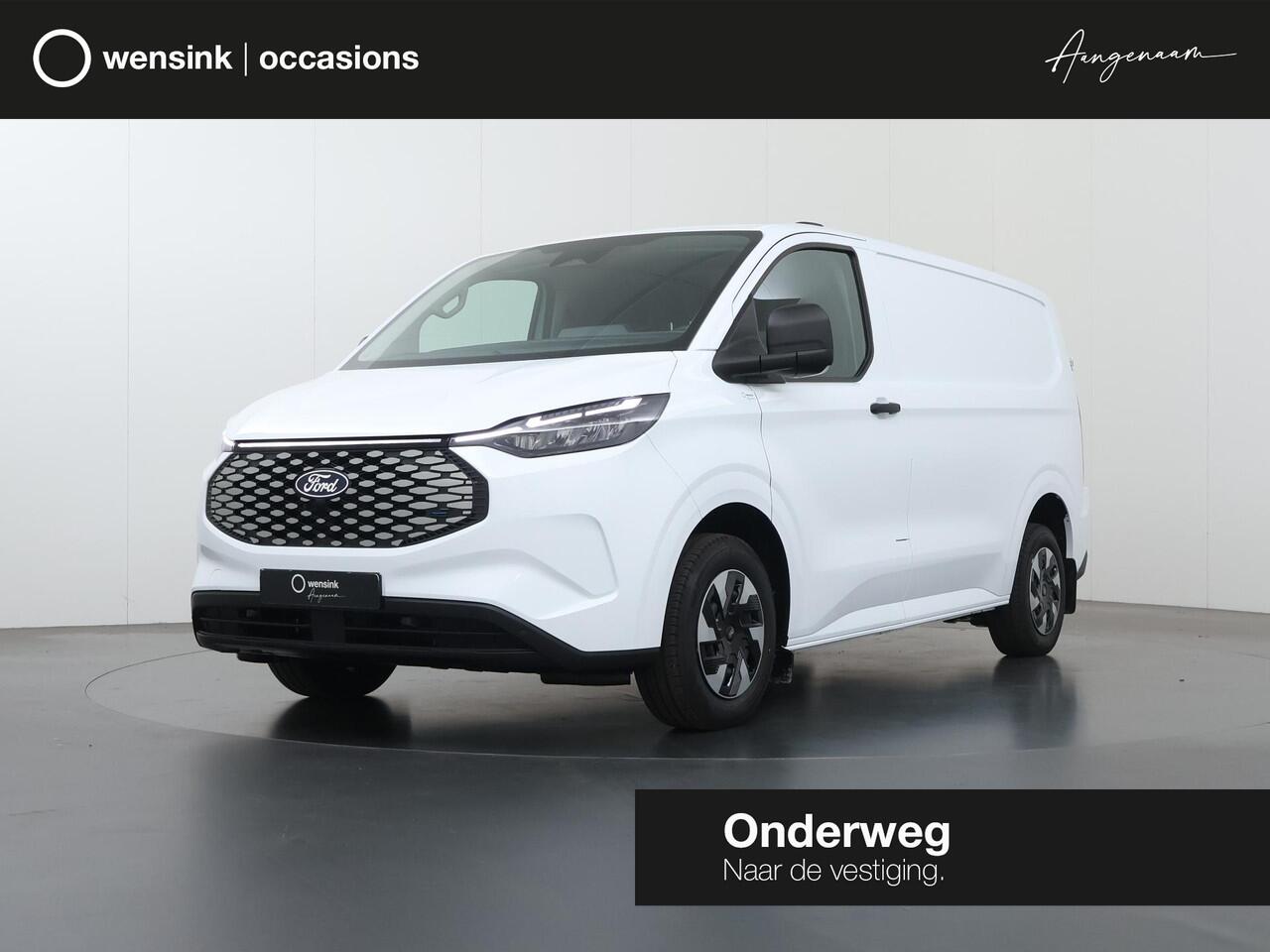 Ford TRANSIT CUSTOM E-Transit 320 | L1 H1 | TREND | 65 kWh | 328 KM RANGE | CLIMATE CONTROL | CARPLAY / ANDROID AUTO | STOELVERWARMING | SPIEGEL VERWARMING | ACHTERUITRIJCAMERA | VOORRUITVERWARMING | LAADRUIMTE PAKKET | VOORBEREIDING 2300 KG TREKHAAK