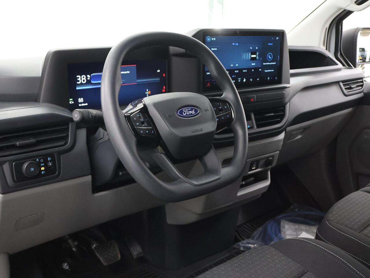 Ford TRANSIT CUSTOM E-Transit 320 | L1 H1 | TREND | 65 kWh | 328 KM RANGE | CLIMATE CONTROL | CARPLAY / ANDROID AUTO | STOELVERWARMING | SPIEGEL VERWARMING | ACHTERUITRIJCAMERA | VOORRUITVERWARMING | LAADRUIMTE PAKKET | VOORBEREIDING 2300 KG TREKHAAK