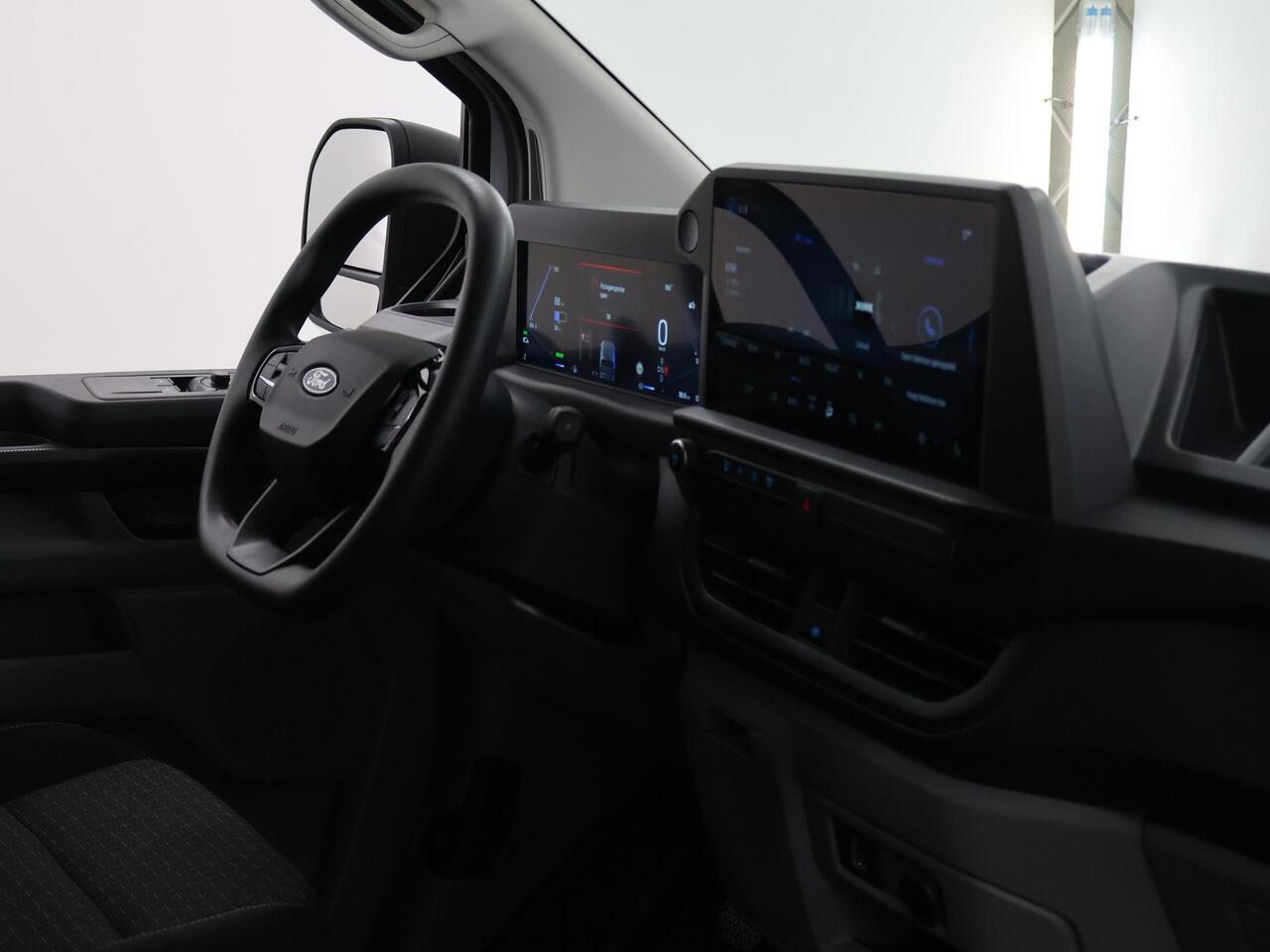 Ford TRANSIT CUSTOM E-Transit 320 | L1 H1 | TREND | 65 kWh | 328 KM RANGE | CLIMATE CONTROL | CARPLAY / ANDROID AUTO | STOELVERWARMING | SPIEGEL VERWARMING | ACHTERUITRIJCAMERA | VOORRUITVERWARMING | LAADRUIMTE PAKKET | VOORBEREIDING 2300 KG TREKHAAK