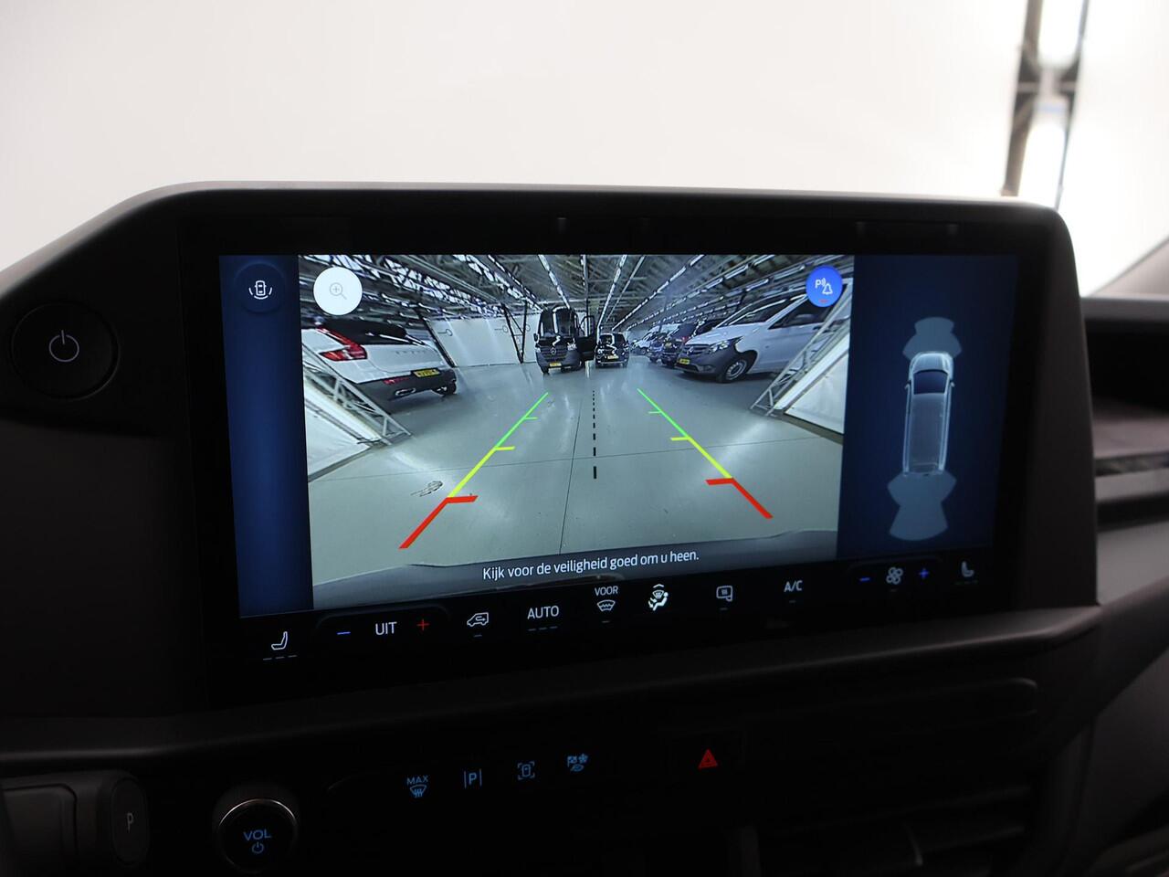 Ford TRANSIT CUSTOM E-Transit 320 | L1 H1 | TREND | 65 kWh | 328 KM RANGE | CLIMATE CONTROL | CARPLAY / ANDROID AUTO | STOELVERWARMING | SPIEGEL VERWARMING | ACHTERUITRIJCAMERA | VOORRUITVERWARMING | LAADRUIMTE PAKKET | VOORBEREIDING 2300 KG TREKHAAK