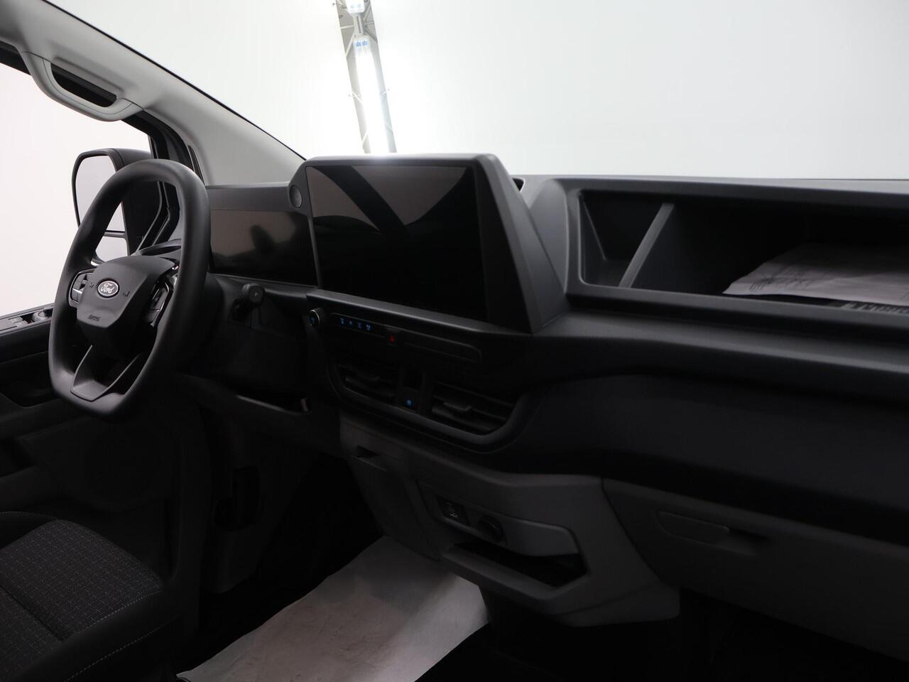 Ford TRANSIT CUSTOM E-Transit 320 | L1 H1 | TREND | 65 kWh | 328 KM RANGE | CLIMATE CONTROL | CARPLAY / ANDROID AUTO | STOELVERWARMING | SPIEGEL VERWARMING | ACHTERUITRIJCAMERA | VOORRUITVERWARMING | LAADRUIMTE PAKKET | VOORBEREIDING 2300 KG TREKHAAK