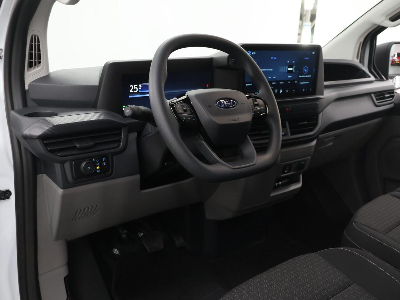 Ford TRANSIT CUSTOM E-Transit 320 | L1 H1 | TREND | 65 kWh | 328 KM RANGE | CLIMATE CONTROL | CARPLAY / ANDROID AUTO | STOELVERWARMING | SPIEGEL VERWARMING | ACHTERUITRIJCAMERA | VOORRUITVERWARMING | LAADRUIMTE PAKKET | VOORBEREIDING 2300 KG TREKHAAK