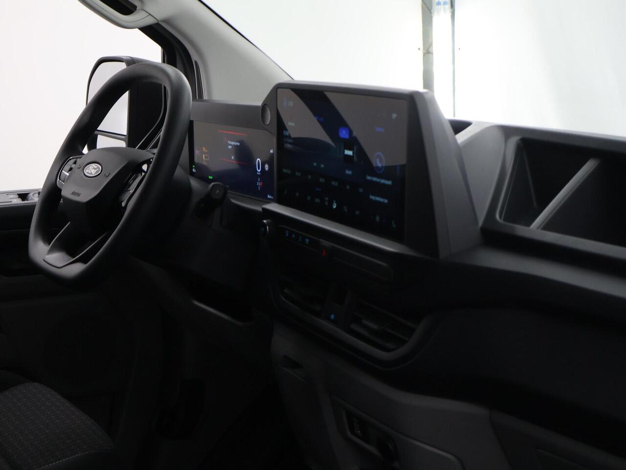 Ford TRANSIT CUSTOM E-Transit 320 | L1 H1 | TREND | 65 kWh | 328 KM RANGE | CLIMATE CONTROL | CARPLAY / ANDROID AUTO | STOELVERWARMING | SPIEGEL VERWARMING | ACHTERUITRIJCAMERA | VOORRUITVERWARMING | LAADRUIMTE PAKKET | VOORBEREIDING 2300 KG TREKHAAK