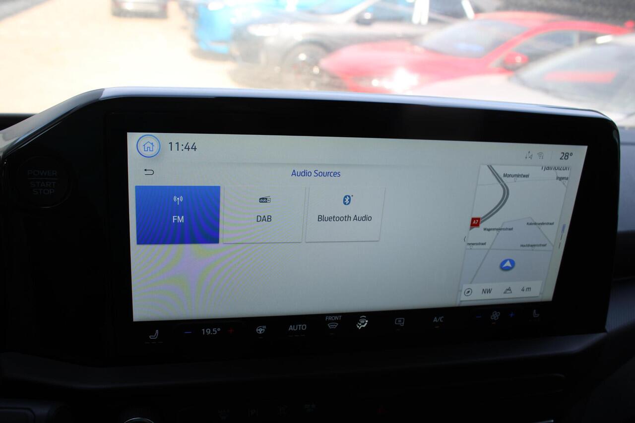 Ford TRANSIT CUSTOM 320 2.5 PHEV L2H1 Sport 233pk | Zuid | Inklapbare trekhaak | 19 inch lichtmetalen Sport velgen (mat zwart) | Verwarmbaar stuurwiel | Navigatie systeem | B&O speakers