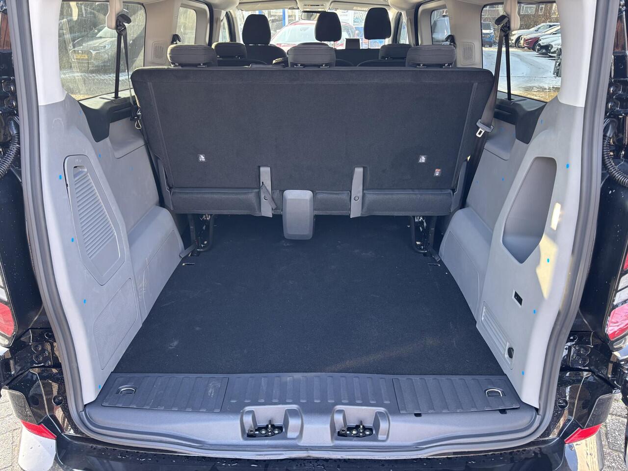 Ford TRANSIT CUSTOM 340 2.5 PHEV L2H1 Limited SCI | 233pk | Kombi | Incl. BTW/BPM | Dubbele zijschuifdeur | Privacy Glass | Inklapbare trekhaak | 17 inch lichtmetalen velgen | Driver Assistance Pack Premium | Verwarmbaar stuurwiel