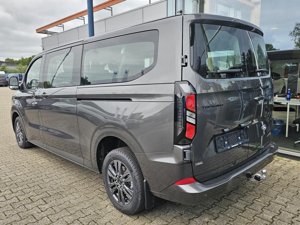 Ford TRANSIT CUSTOM 340 2.5 PHEV L2H1 Limited 233pk | Kombi | Incl. BTW/BPM | Dubbele zijschuifdeur | Privacy Glass | Inklapbare trekhaak | 17 inch lichtmetalen velgen | Driver Assistance Pack Premium | Verwarmbaar stuurwiel