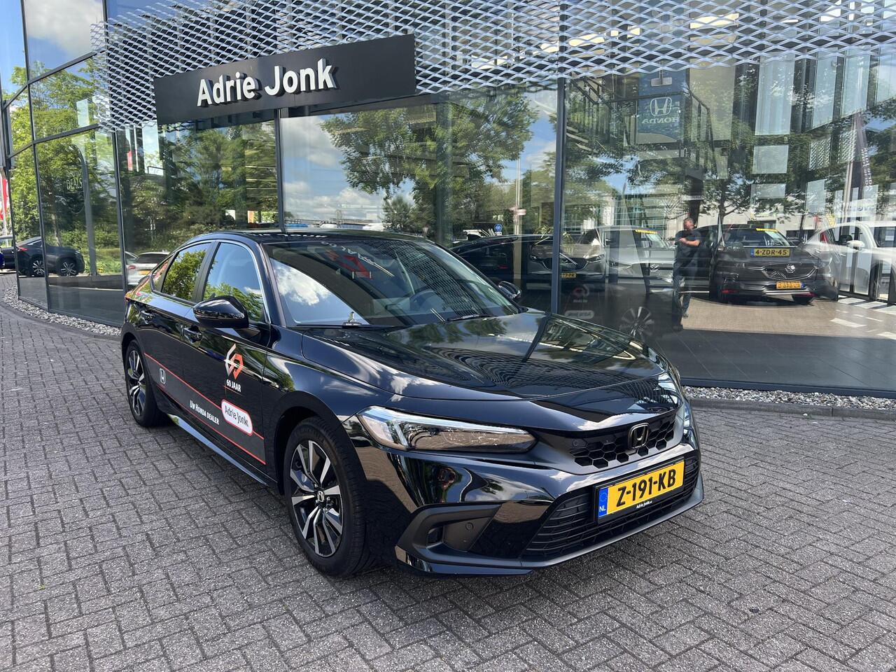 Honda CIVIC 2.0 e:HEV Elegance | AUTOMAAT | SPORTPAKKET | APPLE CARPLAY | ACHTERUITRIJCAMERA | PARKEERSENSOREN | DODEHOEKDETECTIE | ADAPTIEF CRUISE CONTROL | DEMO |