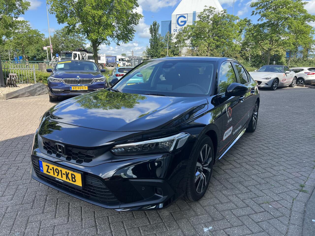 Honda CIVIC 2.0 e:HEV Elegance | AUTOMAAT | SPORTPAKKET | APPLE CARPLAY | ACHTERUITRIJCAMERA | PARKEERSENSOREN | DODEHOEKDETECTIE | ADAPTIEF CRUISE CONTROL | DEMO |