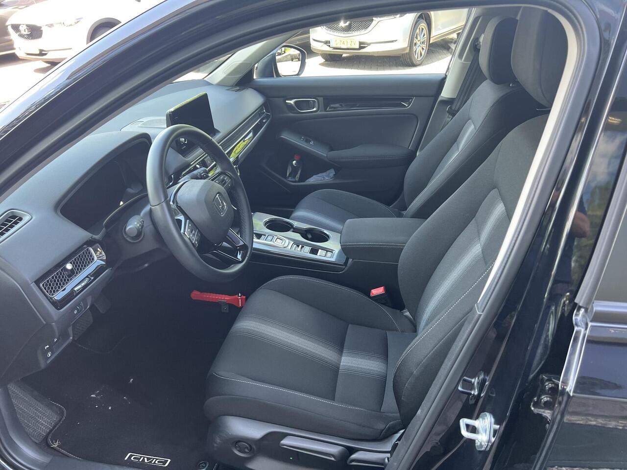 Honda CIVIC 2.0 e:HEV Elegance | AUTOMAAT | SPORTPAKKET | APPLE CARPLAY | ACHTERUITRIJCAMERA | PARKEERSENSOREN | DODEHOEKDETECTIE | ADAPTIEF CRUISE CONTROL | DEMO |