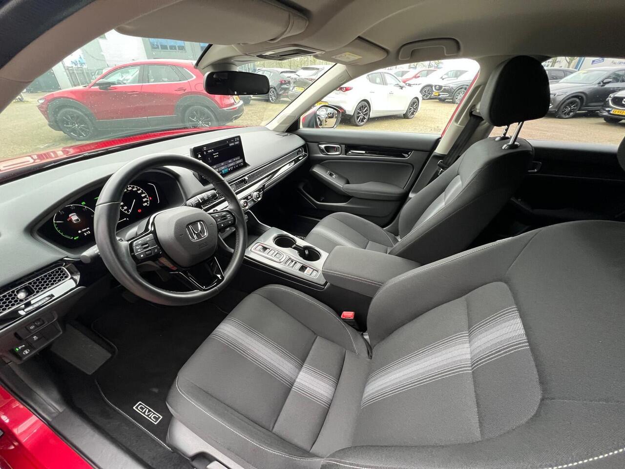 Honda CIVIC 2.0 e:HEV Elegance | AUTOMAAT | TREKHAAK |CLIMATE CONTROL | STOELVERWARMING | APPLE CARPLAY | ANDROID AUTO | CRUISE CONTROL ADAPTIEF