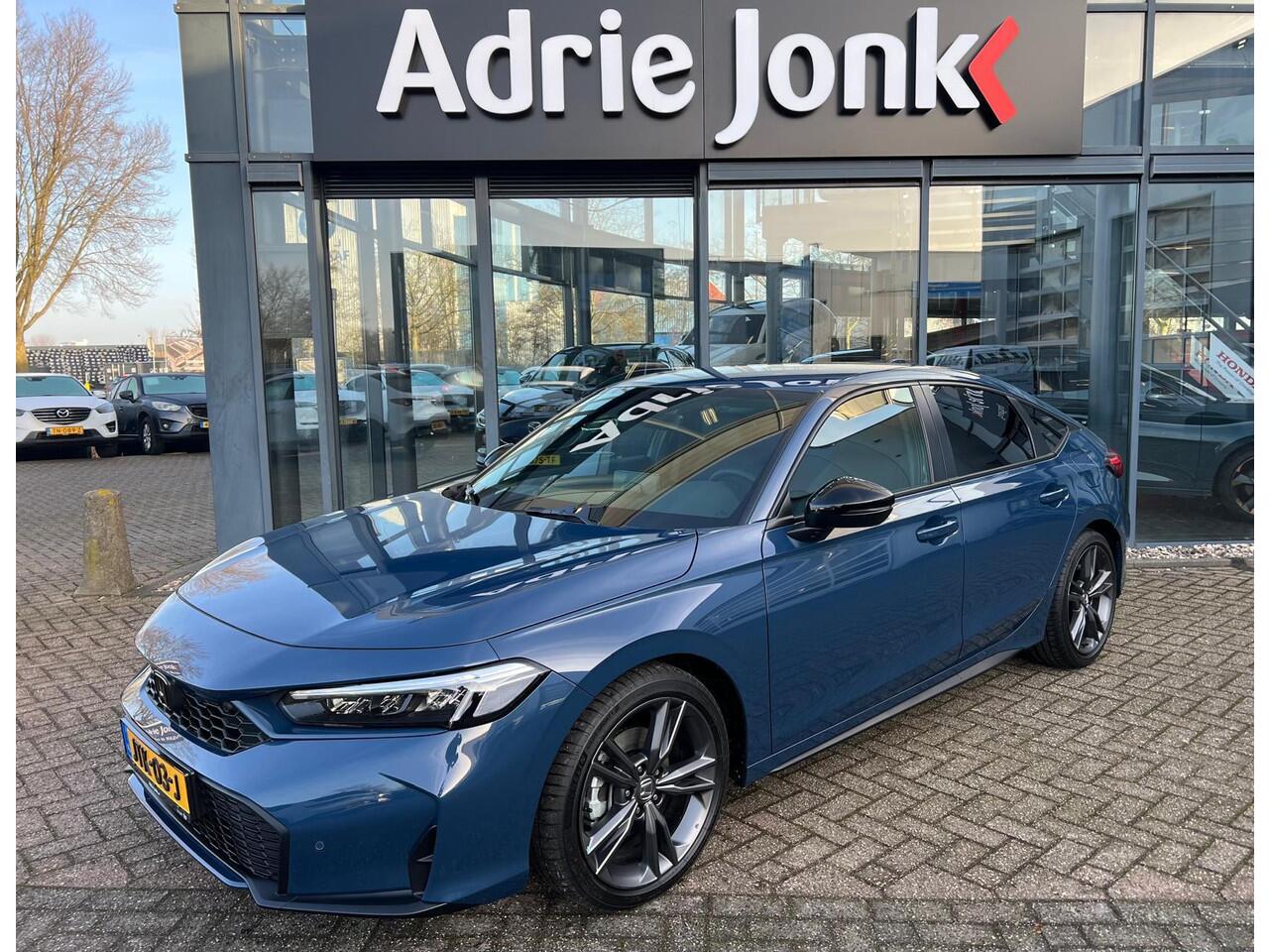 Honda CIVIC 2.0 e:HEV Sport | DEMO | FULL HYBRID | 18 INCH | APPLE & ANROID AUTO | CAMERA | STUUR + STOELVERWARMING | NAVIGATIE |