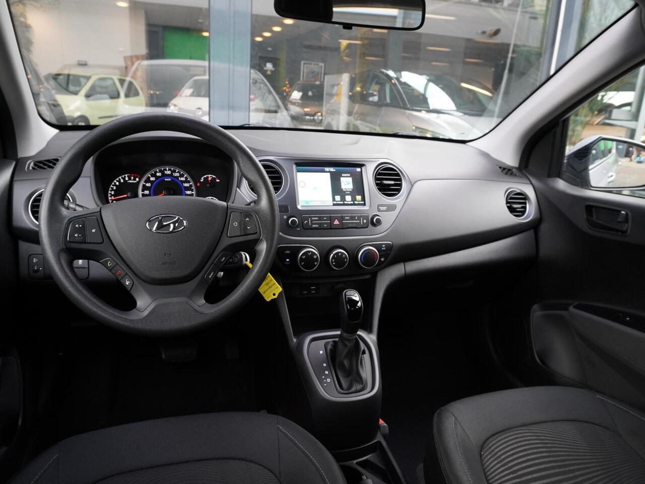 Hyundai I 10 1.0i Comfort 5p. AUTOMAAT / 26.000KM!! / 1E EIGENAAR / DEALER ONDERHOUDEN / NAVI / SMART PACK / PDC A / AIRCO / BLUETOOTH / DAB / APPLE CARPLAY / ANDROID AUTO / 14''