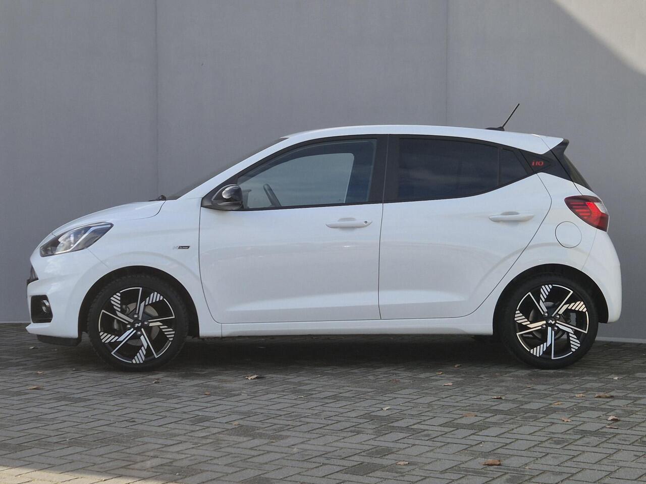 Hyundai I 10 1.0 T-GDI N Line 5-zits Handgeschakeld / Fabrieksgarantie tot 11-2028 / Allseason banden / Dealer onderhouden / Stuur-, en Stoel verwarming / Cruise control / Achteruitrijcamera / Apple Carplay Android Auto / Climate control /