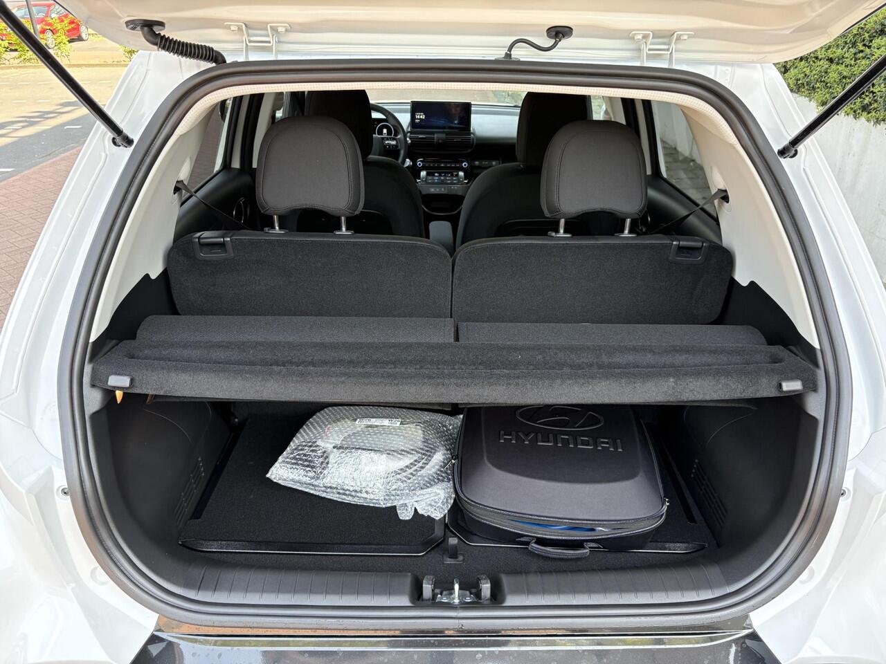 Hyundai INSTER Pulse 49 kWh | ¤3325 KORTING | CAMERA | CLIMATE CONTROL | PARKEERSENSOREN | DRAADLOZE OPLADER |