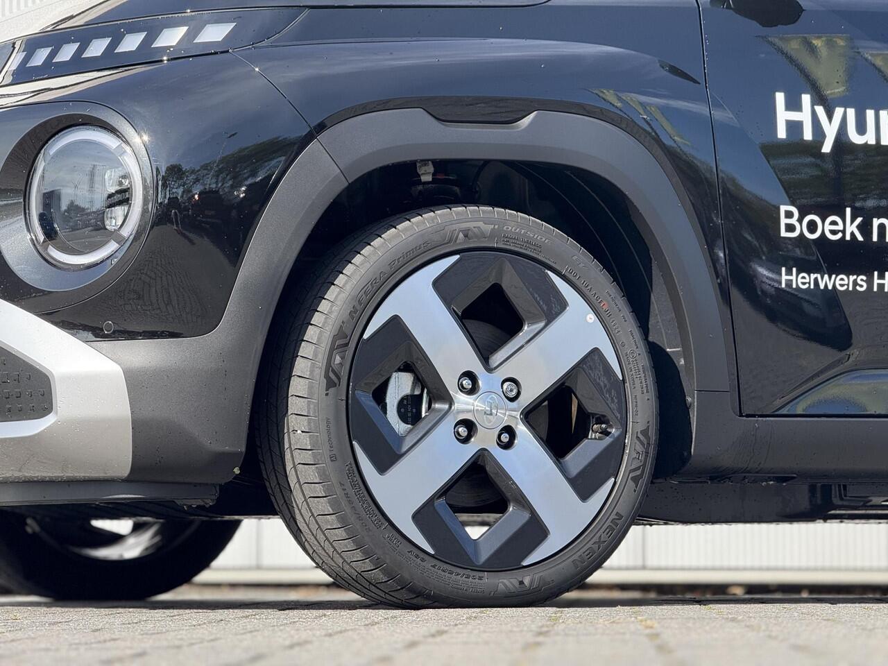 Hyundai INSTER Evolve 49 kWh / Winter & Tech Pack / 370 KM WLTP / 360 Camera / Warmtepomp / Stoel- & Stuurverwarming / Dynamische Navigatie / LED /