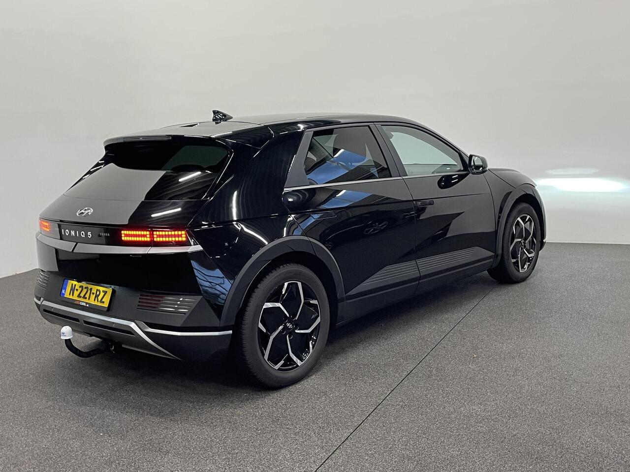 Hyundai IONIQ 5 Style 58 kWh SOH 98% Warmtepomp Airco ECC Navi Carplay Virtual Dashboard Trekhaak PDC VA+ Camera Full LED Adaptive Cruise 19" Velgen