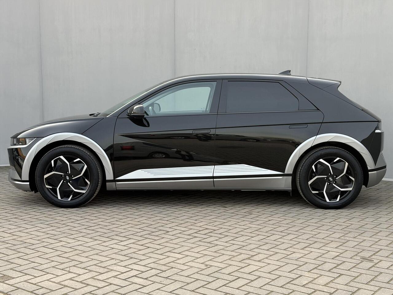 Hyundai IONIQ 5 Connect 73kWh / SOH 97.5 % / Batterijgarantie tot 11-2029 / Dealer Onderhouden / Batterij Garantie 8 Jaar / Warmtepomp / CCS Snel Laden / Adaptieve Cruise / Camera / Navigatie / BOSE / Dode hoek Detectie / Stoel Verwarming / Stuurwiel Verwaring /