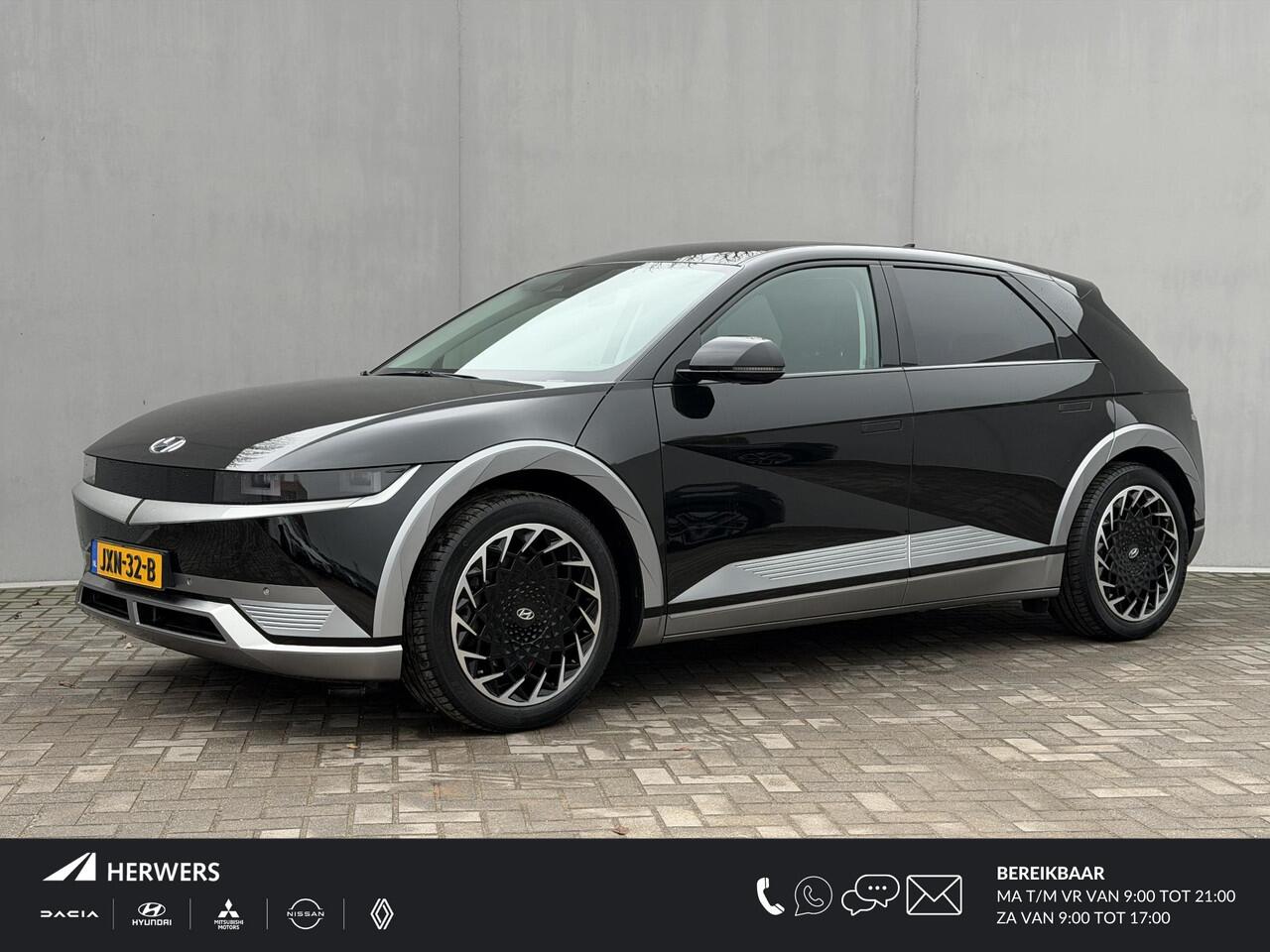 Hyundai IONIQ 5 Connect 73kWh Automaat / Afneembare Trekhaak 1600 Kg / SOH 98% / Dealer onderhouden / Fabrieksgarantie tot 12-2026 / 8 Jaar Batterij Garantie / Warmtepomp / Camera / Navigatie / Stoel en Stuurwiel Verwarming / Achterbank Verwarming / Elektr. Achterkle