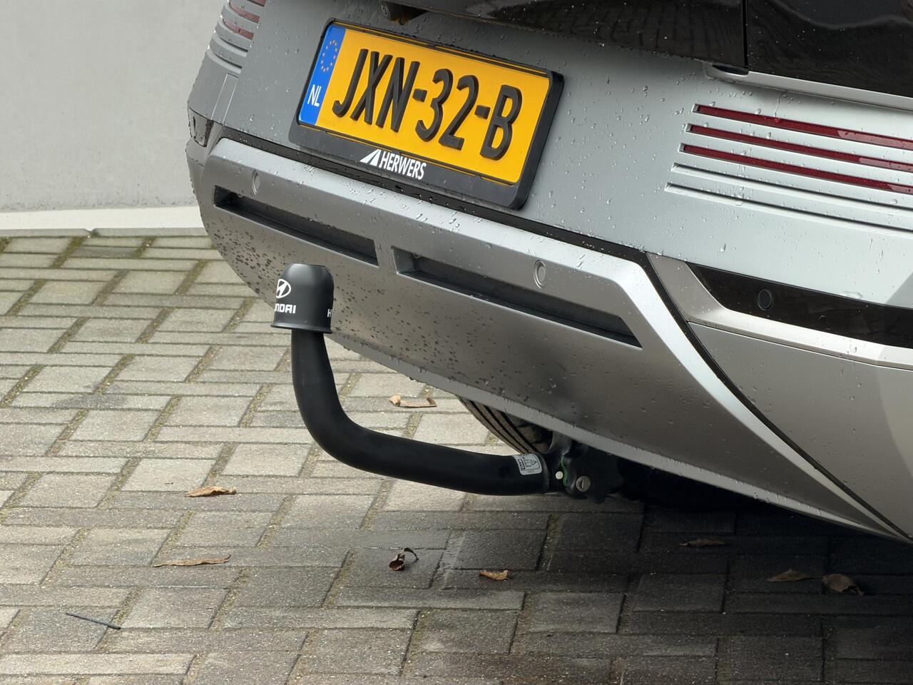 Hyundai IONIQ 5 Connect 73kWh Automaat / Afneembare Trekhaak 1600 Kg / SOH 98% / Dealer onderhouden / Fabrieksgarantie tot 12-2026 / 8 Jaar Batterij Garantie / Warmtepomp / Camera / Navigatie / Stoel en Stuurwiel Verwarming / Achterbank Verwarming / Elektr. Achterkle