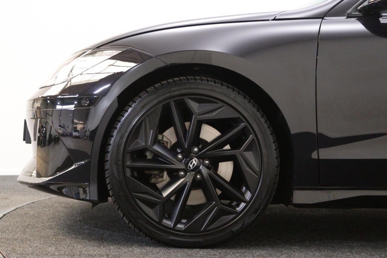 Hyundai IONIQ First Edition AWD 77.4kWh | Panorama dak | Navigatie | Camera |