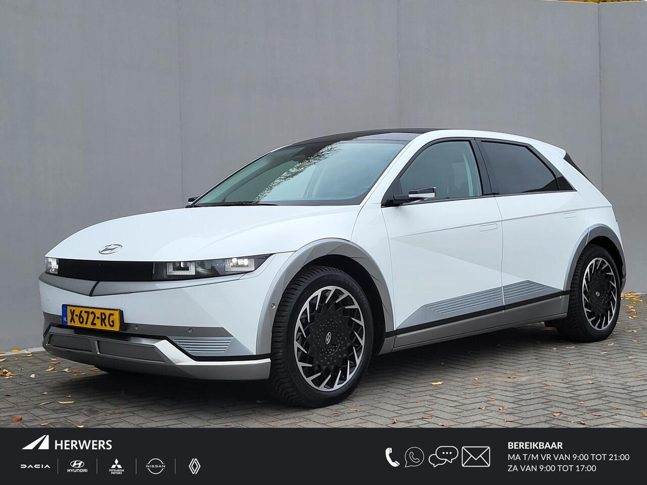 Hyundai IONIQ 5 Lounge AWD 77.4 kWh / 100% SOH / Origineel NL Auto / Panoramadak / Camera buitenspiegels / DAB / Bose audio / HUD / Navigatie / Stuur-, voorstoel- en achterbank verwarming / Stoelventilatie /