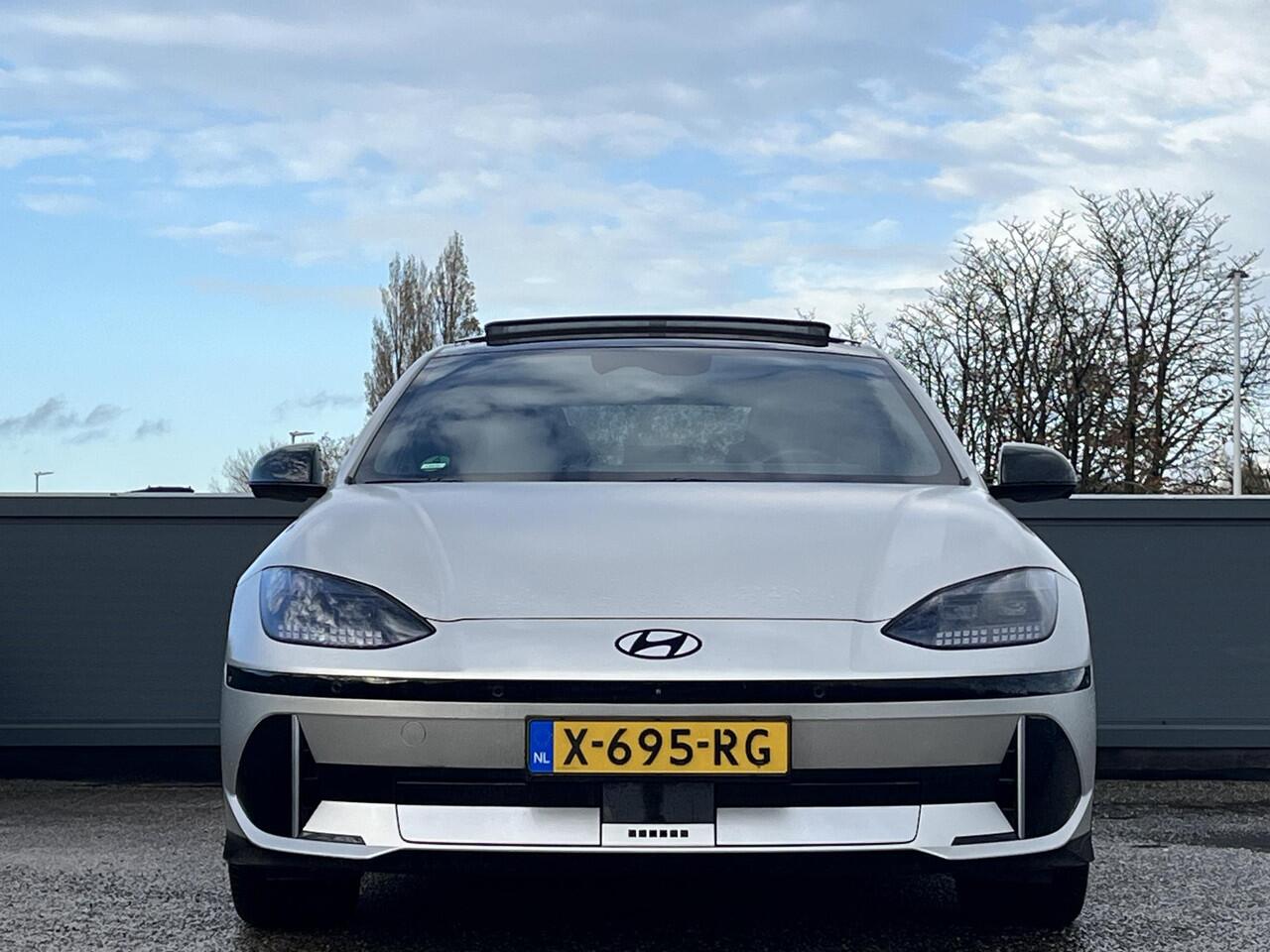 Hyundai IONIQ 6 First Edition AWD 77.4kWh 325pk | SCHUIF/KANTELDAK | 800V SNELLADEN | 20? LICHTMETALEN VELGEN & MATZWARTE DESIGNACCENTEN | BOSE PREMIUM AUDIO | PREMIUM INTERIEUR |