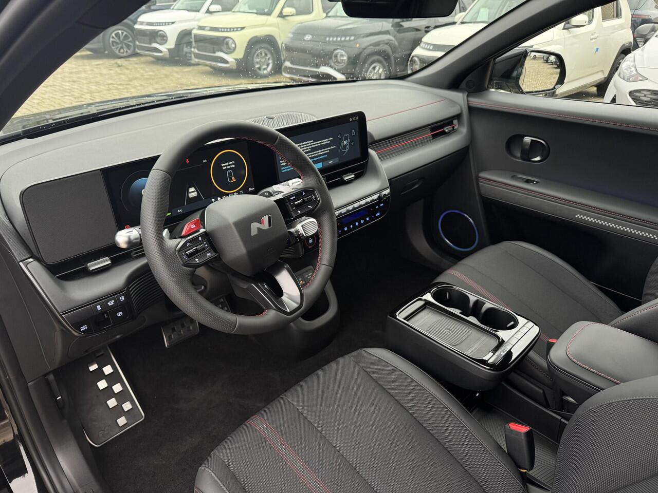 Hyundai IONIQ 5 N Line Business 84 kWh | Achteruitrijcamera | Stoelverwarming | Stuurverwarming | Elektrische stoelen | Verschuifbare 2e zitrij | Elektrische achterklep | Parkeersensoren voor/achter | Draadloze applecarplay en android auto |