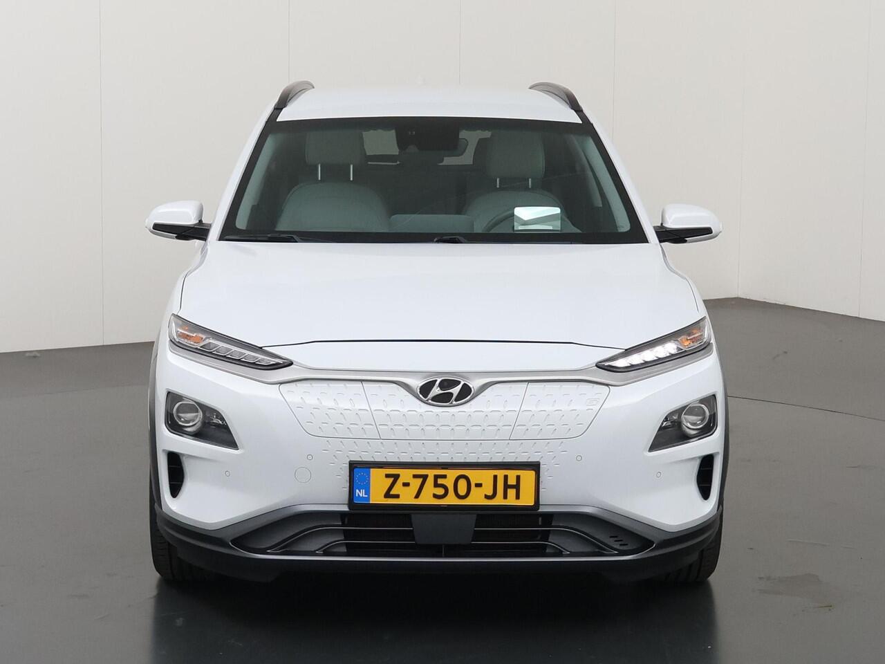 Hyundai Kona EV Fashion 64 kWh | SOH 95% | Warmtepomp | Parkeercamera | Krell Audio | Cruise Control Adaptief | Parkeercamera |