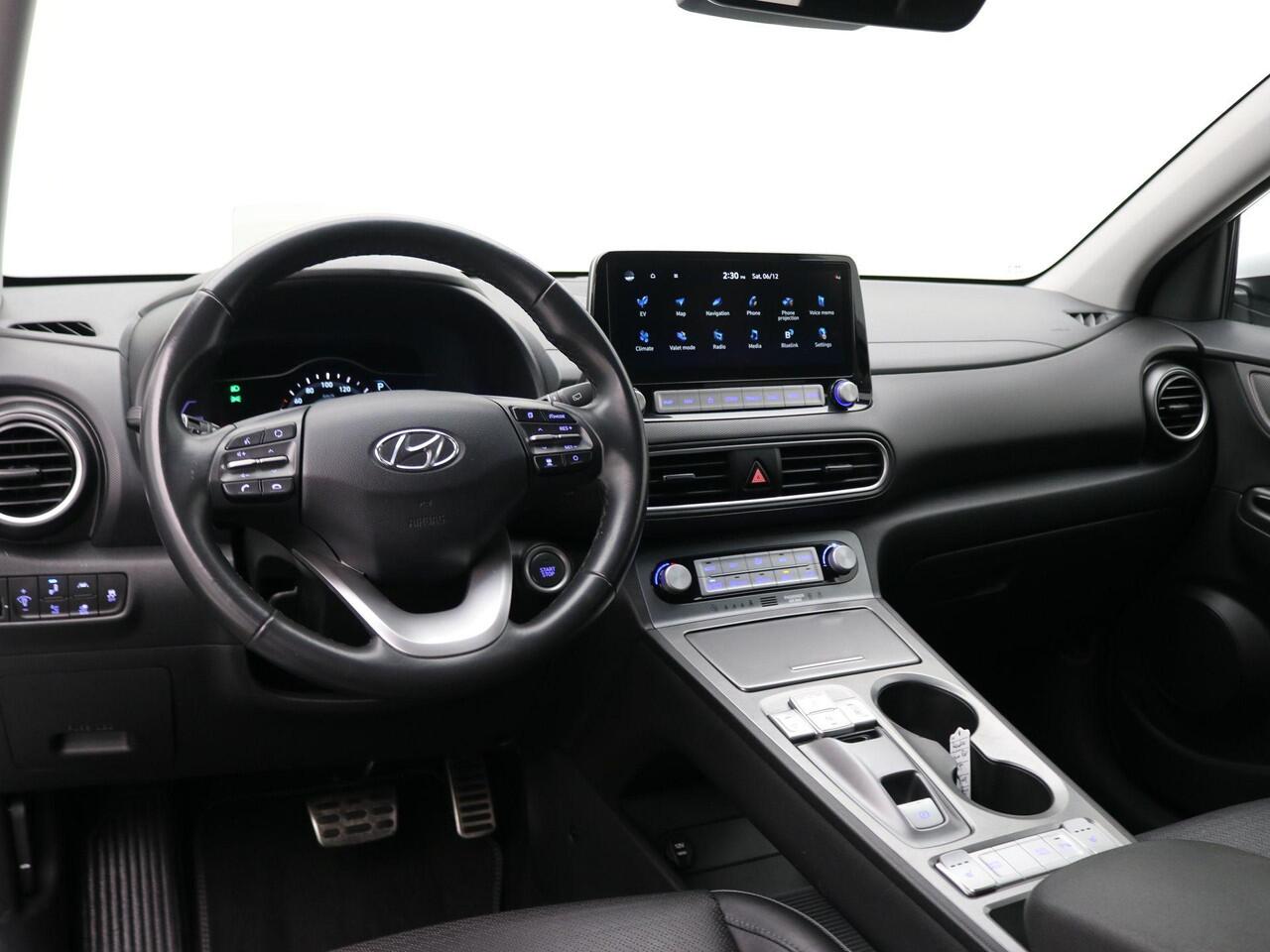 Hyundai Kona EV Fashion 64 kWh / SOH 100% / Lederen Bekleding / Navigatie / KRELL Audio / Adaptive Cruise Control / Climate Control / Achteruitrijcamera /