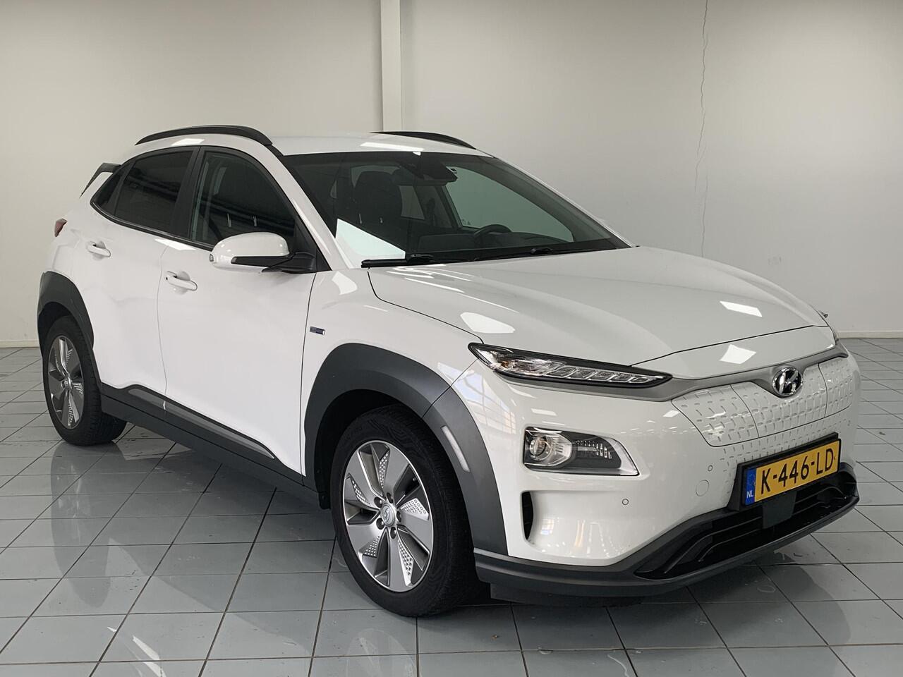 Hyundai Kona EV Limited 64 kWh SOH 96,8 % | NAVIGATIE | ACHTERUITRIJCAMERA | LEDEREN BEKLEDING