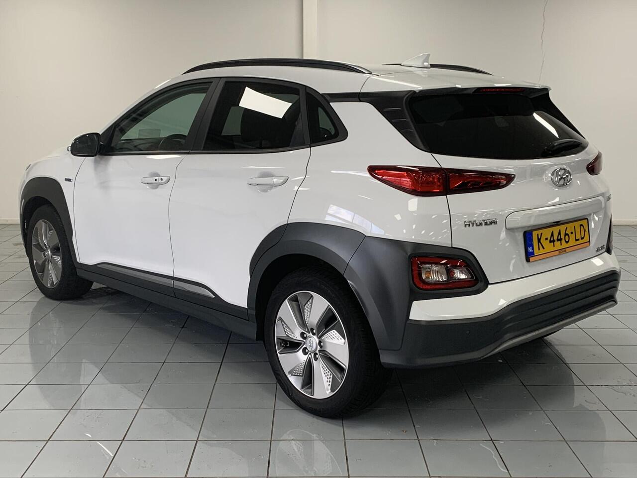 Hyundai Kona EV Limited 64 kWh SOH 96,8 % | NAVIGATIE | ACHTERUITRIJCAMERA | LEDEREN BEKLEDING