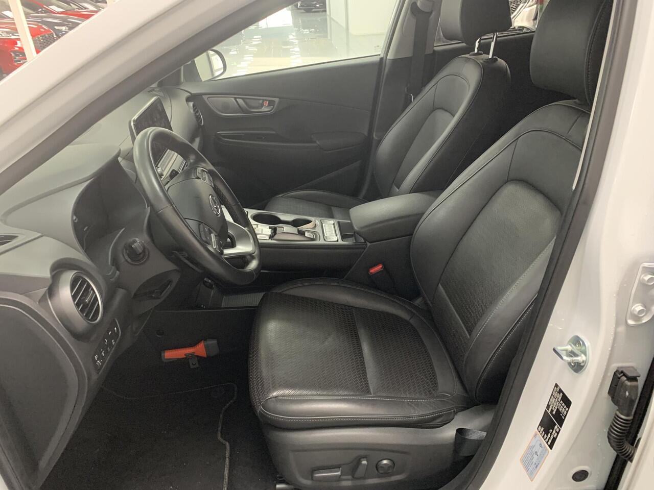 Hyundai Kona EV Limited 64 kWh SOH 96,8 % | NAVIGATIE | ACHTERUITRIJCAMERA | LEDEREN BEKLEDING