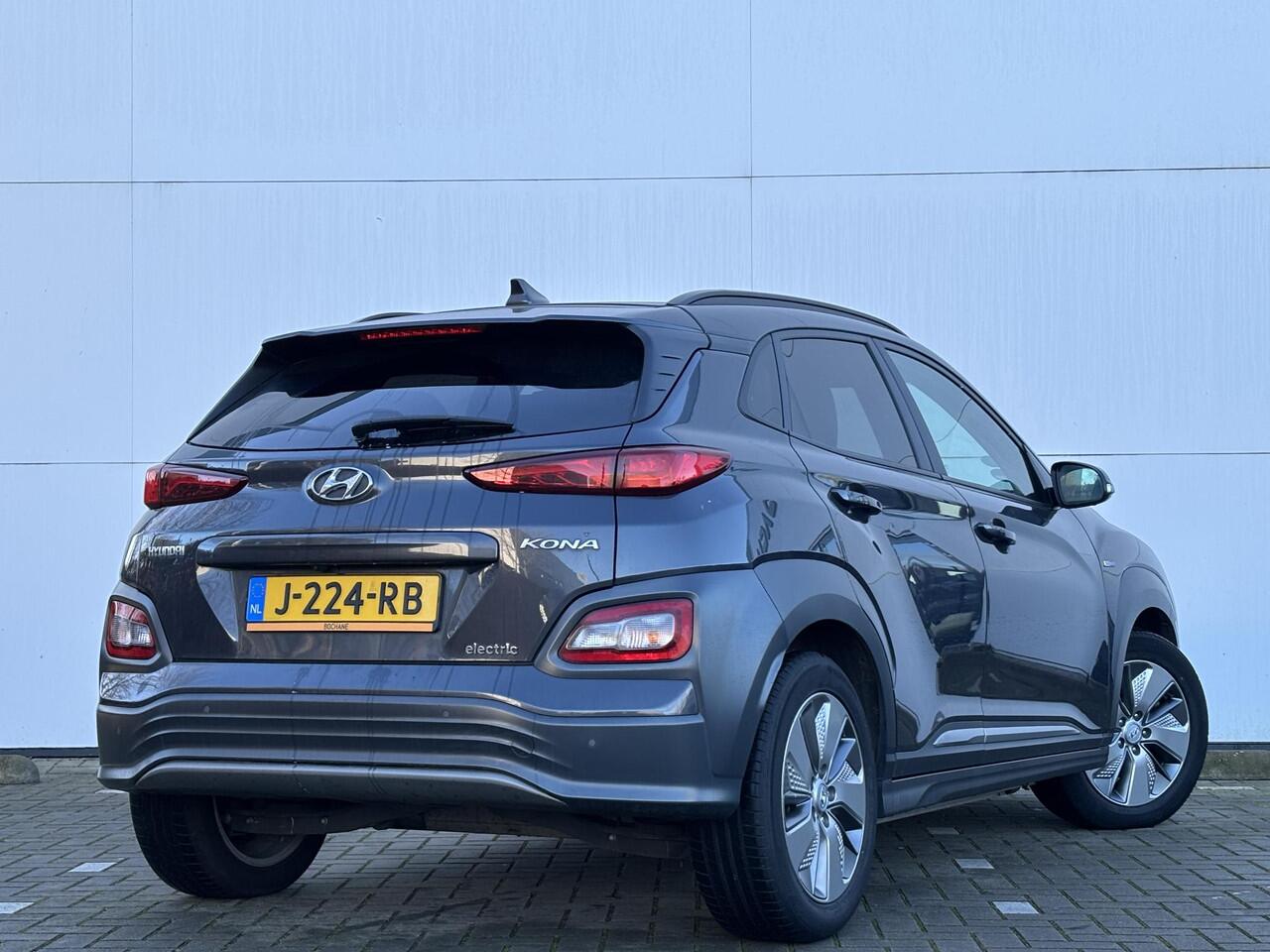 Hyundai Kona EV Premium 64 kWh | SOH 95,3% | Vol leder | Stoelverwarming |
