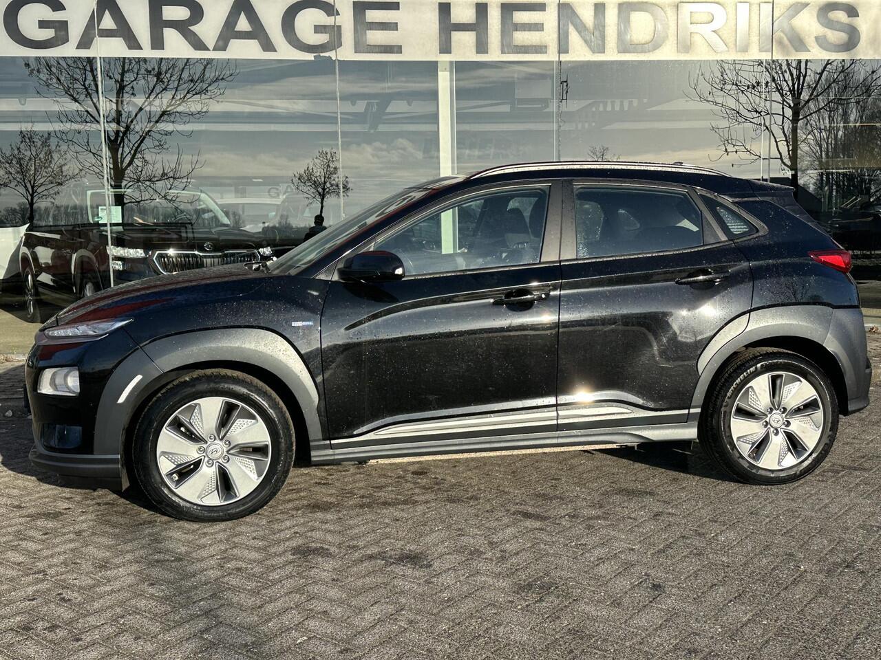 Hyundai Kona EV Comfort 64 kWh | SOH: 94,7 % | 3 Fase | Warmtepomp | Navi | Adaptive CC | Climate |
