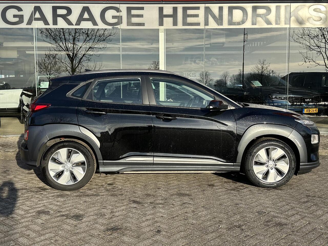 Hyundai Kona EV Comfort 64 kWh | SOH: 94,7 % | 3 Fase | Warmtepomp | Navi | Adaptive CC | Climate |