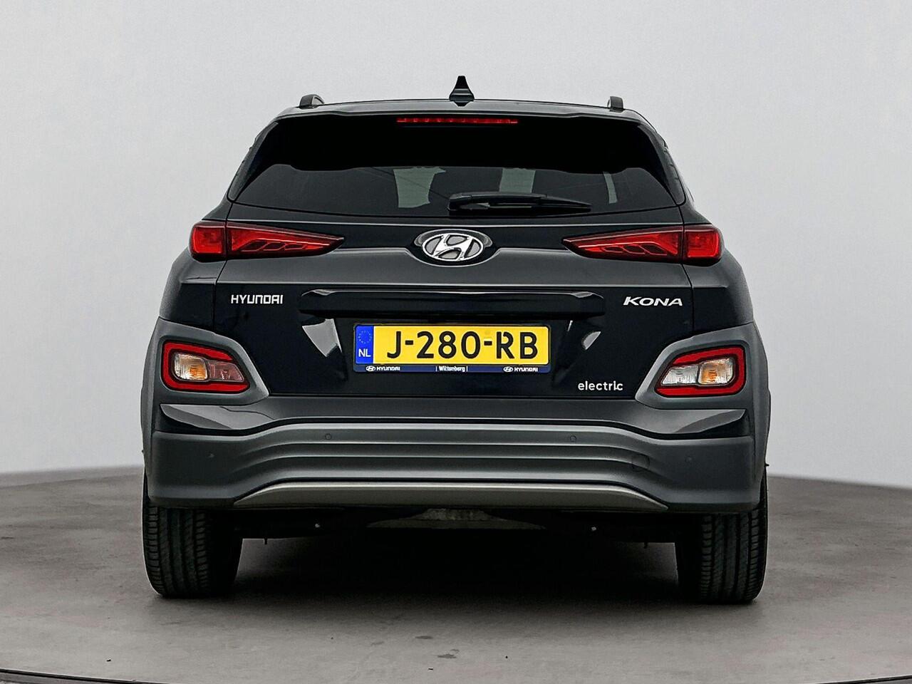 Hyundai Kona EV Premium 64 kWh | Soh 96,2% | Achterruitrij Camera | Dodehoek Detectie | Stoel verwarming & ventilatie | DAB Radio |