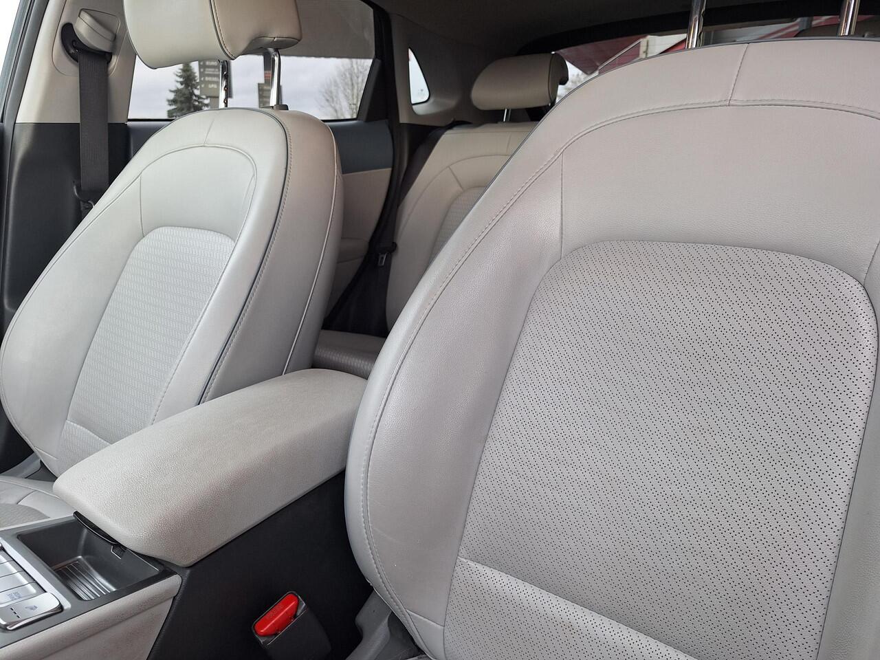 Hyundai Kona EV Premium 64 kWh | SOH: 94,6% | Leder | Warmtepomp | Adaptive CC | Navi | Camera |