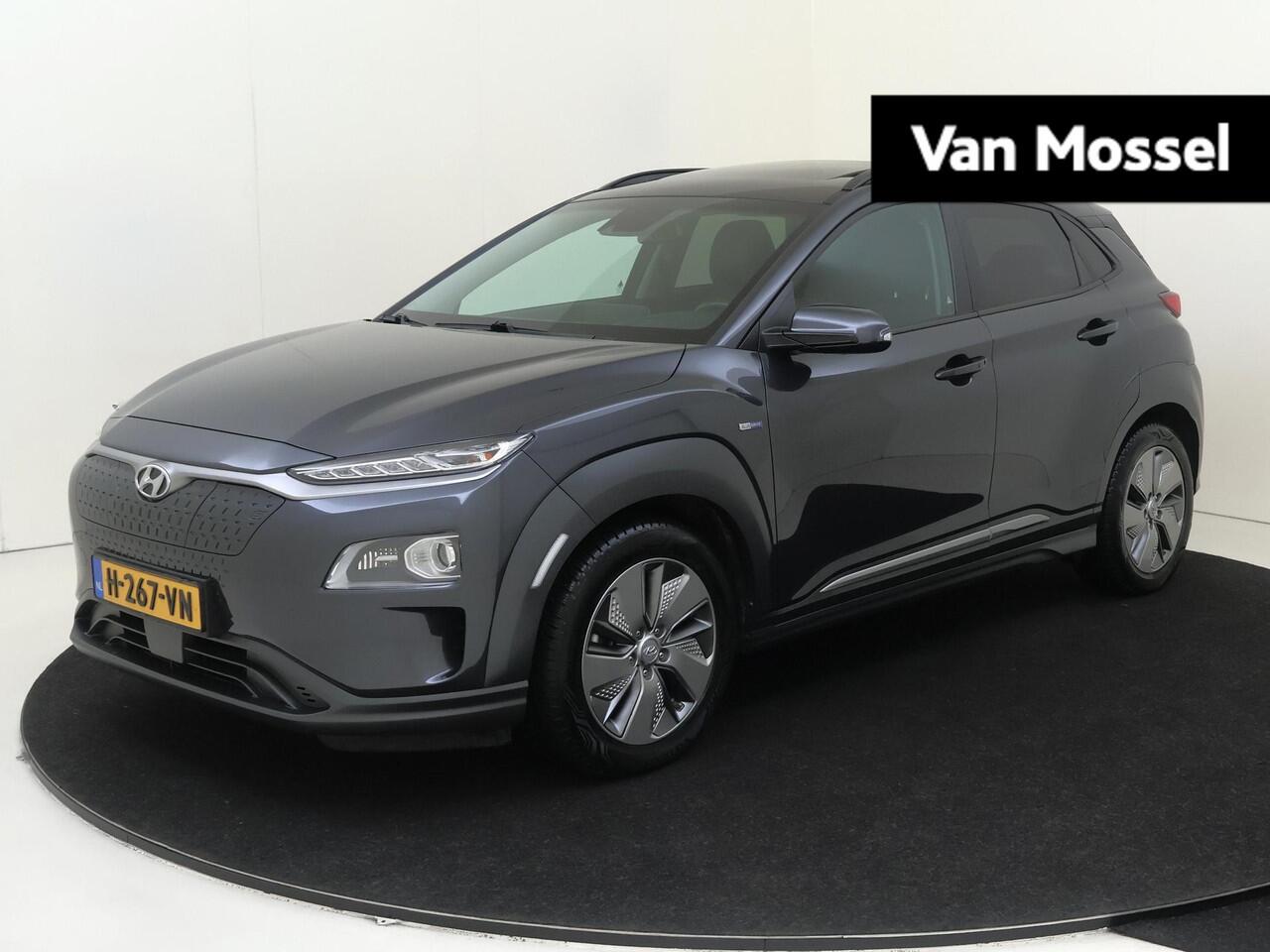 Hyundai Kona EV Premium 204Pk 64 kWh | Navigatie | Apple & Android Carplay | Elektrisch Schuifkanteldak | Stoelverwarming & Verkoeling | Elektrisch Verstelbare Bestuurdersstoel | Achteruitrijcamera | Parkeersensoren Voor & Achter | Climate Control |