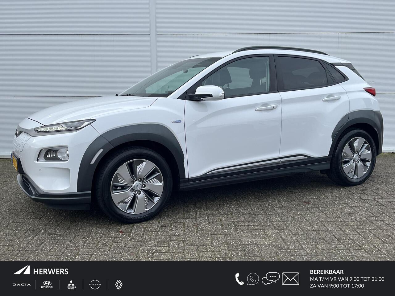 Hyundai Kona EV Limited 64 kWh / achterbank verwarmd / Apple Carplay/Android Auto / cruise control adaptief met Stop&Go en stuurhulp /