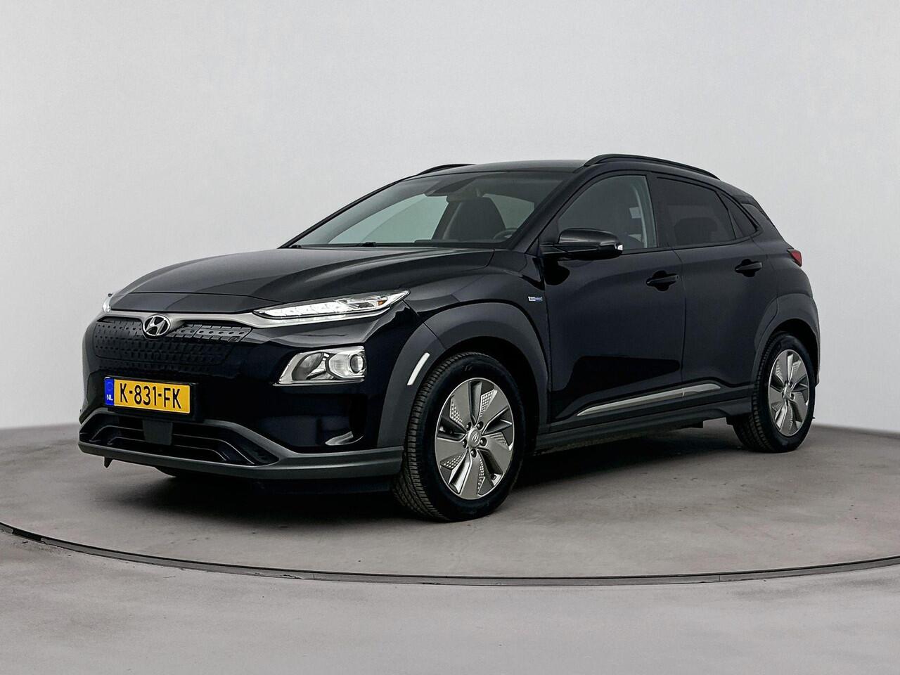 Hyundai Kona EV Fashion 64 kWh | Navigatie| SOH 95.7% | Achteruitrij Camera | Dodehoek Detectie | Head Up Display |