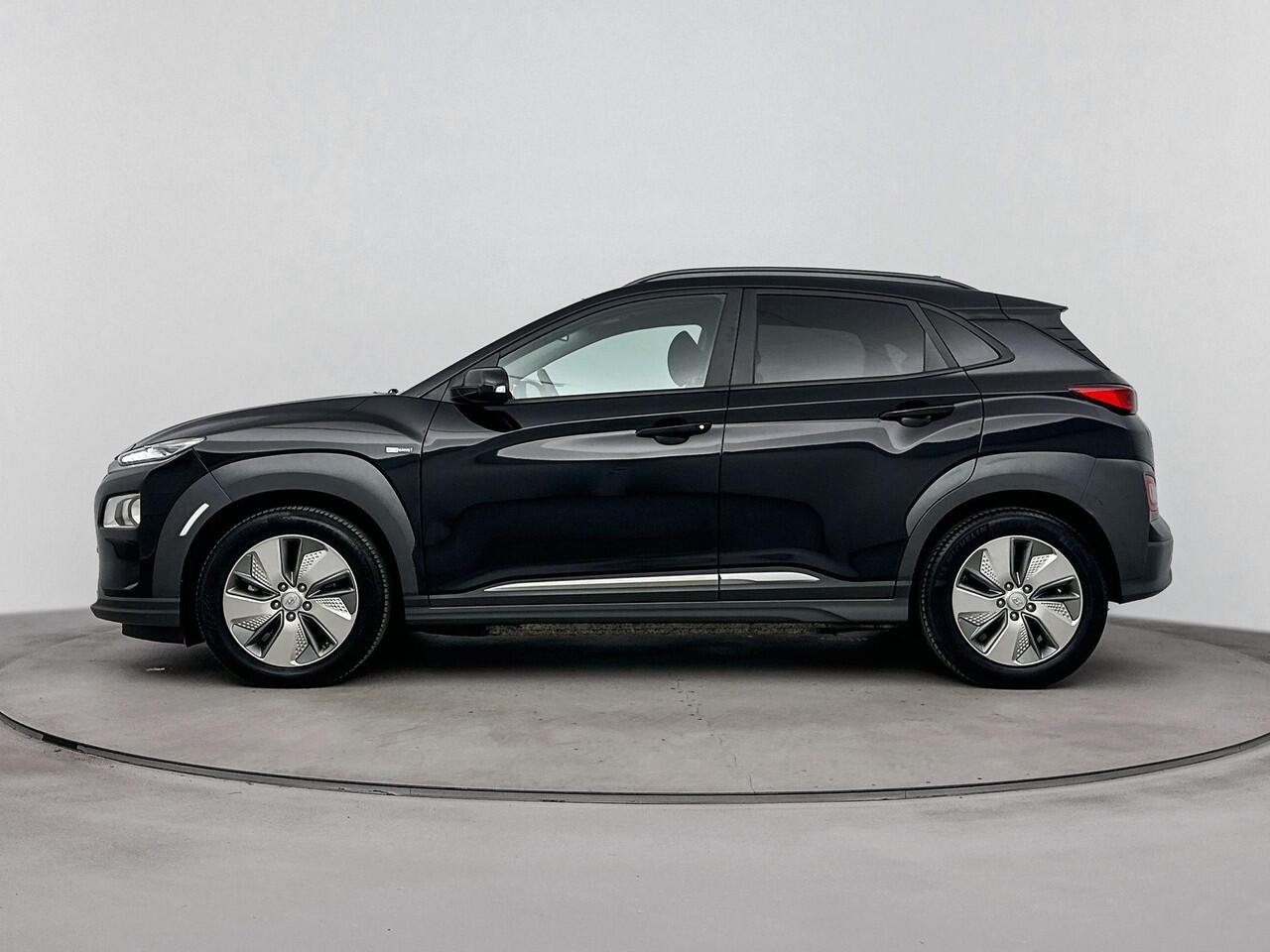 Hyundai Kona EV Fashion 64 kWh | Navigatie| SOH 95.7% | Achteruitrij Camera | Dodehoek Detectie | Head Up Display |
